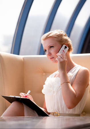 Beautiful woman talking over a phone