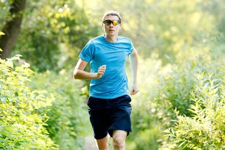 young jogger runnig at the park