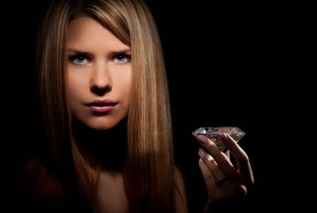 beautiful woman with a diamondの写真素材