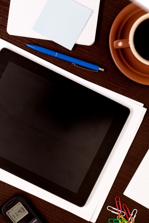Workplace with blank digital tabletの写真素材