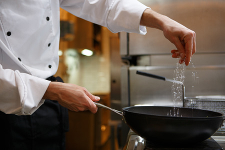 Chef preparing foodの写真素材