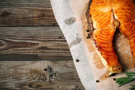 Salmon fillet grilled on cedar boardの写真素材