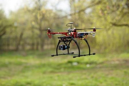 Drone flying in forest