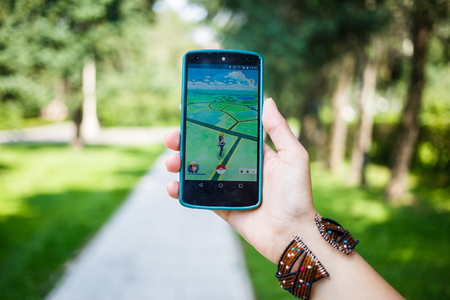 Moscow, Russia - August, 02: Android user play in Pokemon Go augmented reality mobile game on smartphone.のeditorial素材