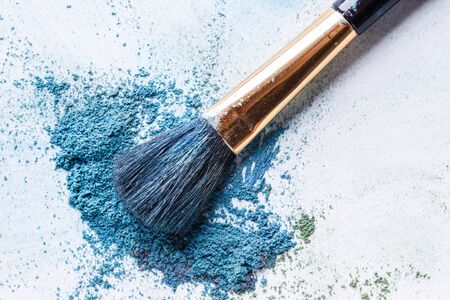 blue shadows with brush piled on white empty backgroundの写真素材