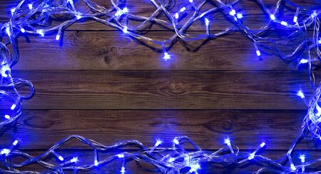 Blue Christmas festoon on empty floor with space for writingの写真素材