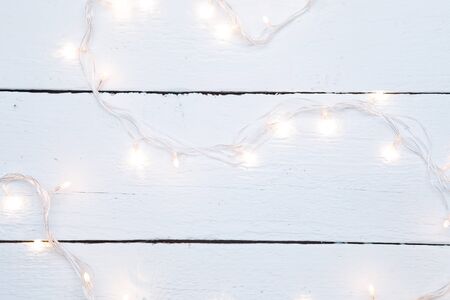 Christmas garland on blank white wooden floorの写真素材