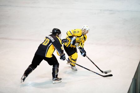 Moscow, Russia - January, 22, 2017: Amateur hockey league LHL-77. Game between hockey team "New Jersey 53" and hockey team "Grizzly-2".のeditorial素材