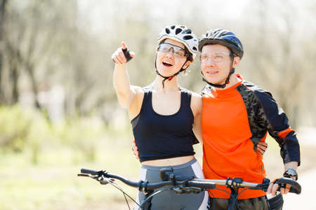 Happy young athletes in helmets
