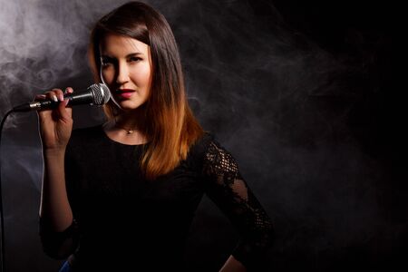 Young girl sings in studioの写真素材