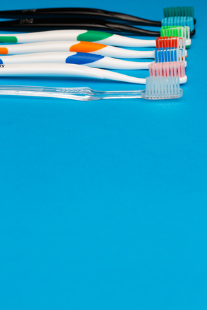Multi colored toothbrushes on topの写真素材