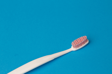 Photo of one pink toothbrush