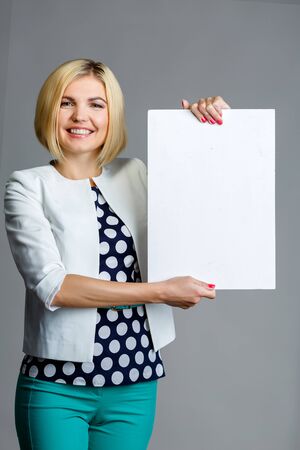 Image of model with paperの写真素材