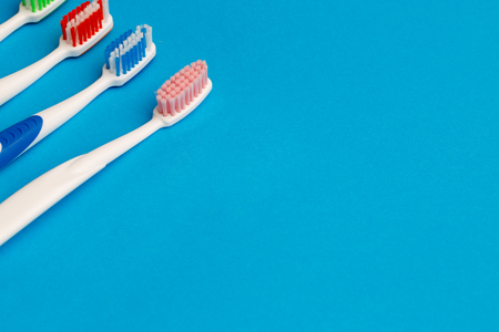 Image of several multi-colored toothbrushesの写真素材