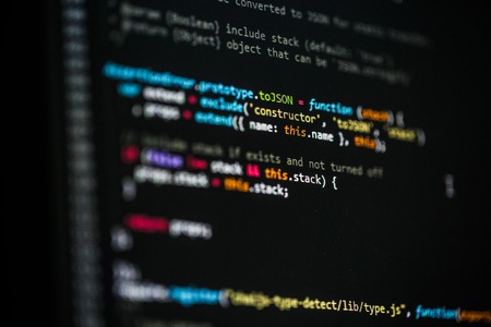 Software developer programming code