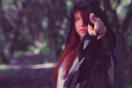 Image of witch pointing finger