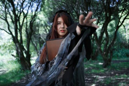 Fantasy photo of black witchの写真素材
