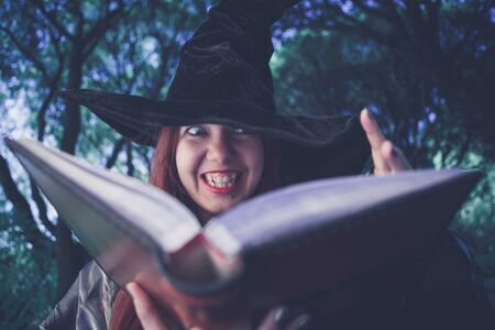 Toned photo of screaming witchの写真素材