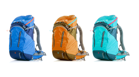 Image of three backpacks on empty background