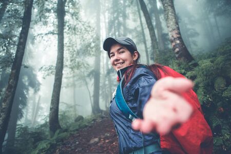 Photo of happy woman in jacketの写真素材