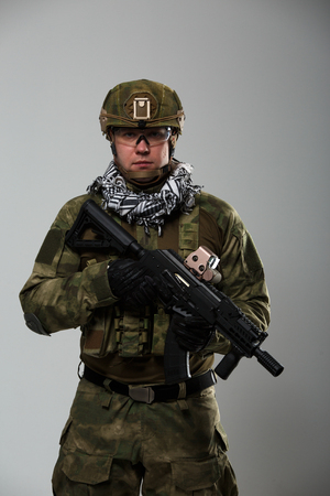 Photo of soldier with gun in his handの写真素材