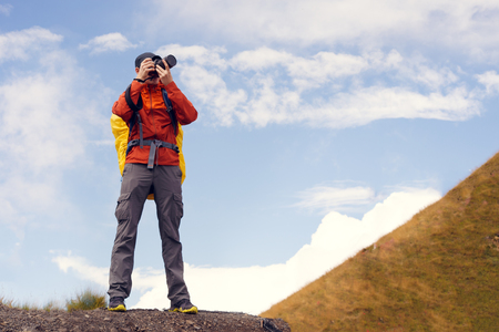 Image of photographer guy with cameraの写真素材