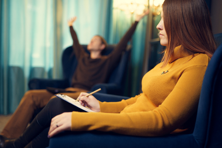 Photo of woman psychologist and man at consultation in office.の写真素材