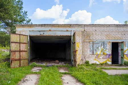 Image of brick garage with open doorsの写真素材