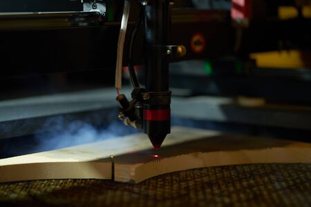 Burning device and wooden board in workshop