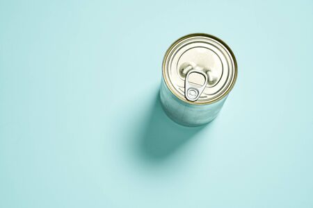 Metal can on blue background.の写真素材