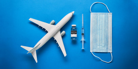 Plane mode, tickets and mask. Resuming flight travel concept due pandemic.の写真素材