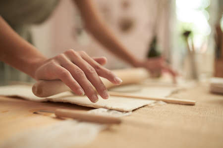 Ceramic artist making slab potteryの写真素材