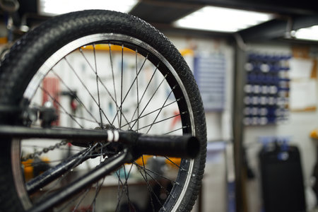 Wheel of BMX bike in workshop