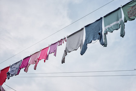 Clothes srying at street. Laundry concept in ghettoの写真素材