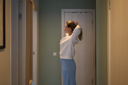 Calm Preparation in a Quiet Hallway Before the Day Begins