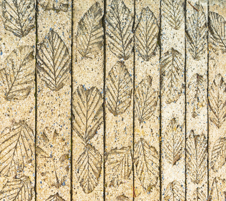 Wall old brickwork with aging floral striped  wall paintingの写真素材