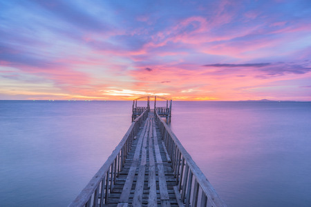 Wooden bridge  along sunset sky at beautifulの写真素材
