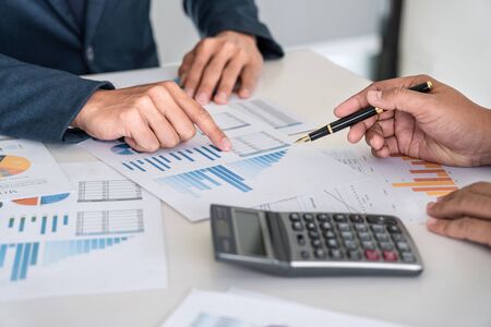 Business team executive presentation on discussion to planning investment financial project and strategy of business making profit conversation with partner.の写真素材