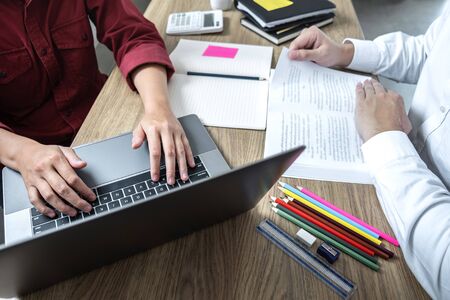 Teaching helping and study course, Team of young teacher or tutor helps students to learning in...