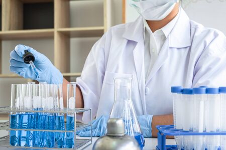 Female scientific researcher or doctor working in laboratory about virus and vaccine antiretroviral...