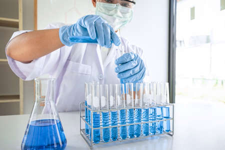 Female scientific researcher or doctor working in laboratory about virus and vaccine antiretroviral...