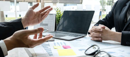 Two business partner team meeting and discussion financial project of investment ideas, presentation...