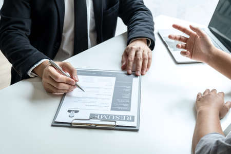 Business committee or interviewer consider and asking about profile of candidate, consider resume conducting a job and conversation listen to answers to thought attitude.の写真素材