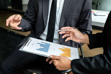 Business executive partner cooperation conference in investment ideas marketing planning and presentation finance project at meeting and strategy of business making to successful and growth profit.の写真素材