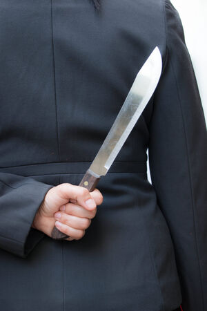 Business women and knifeの写真素材