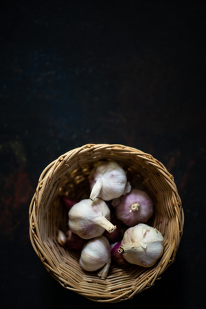 Garlic on black vintage backgroundの写真素材