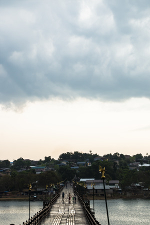Landscape of wooden bridge in rain stromの写真素材