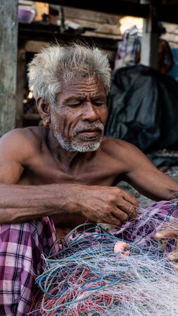 Old Moken in Moken Village at Ko Lao Island Ranong Province Thailand