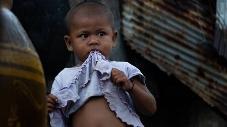 Moken children in Moken Village at Ko Lao Island Ranong Province Thailand