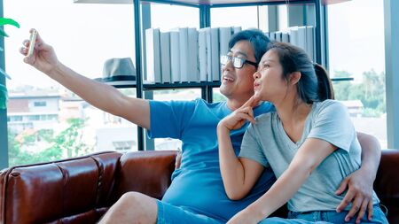 Old man and woman selfieの写真素材
